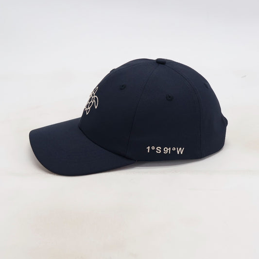 Side view of the ATERRA Ocean Series cap showing Galápagos coordinates