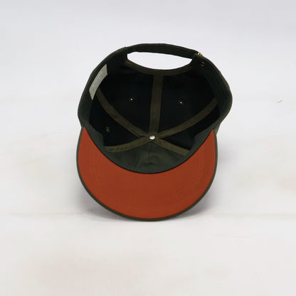 Underside view of the ATERRA Forest Series cap showing the brim and construction